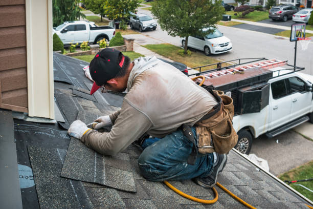 Professional Roofing technician working in Chanhassen, MN